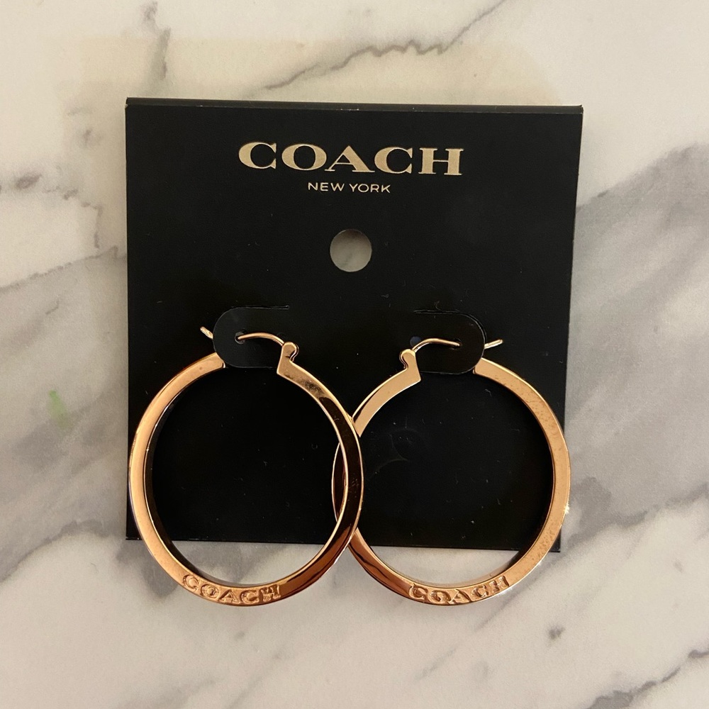 Coach earrings - rose gold - new